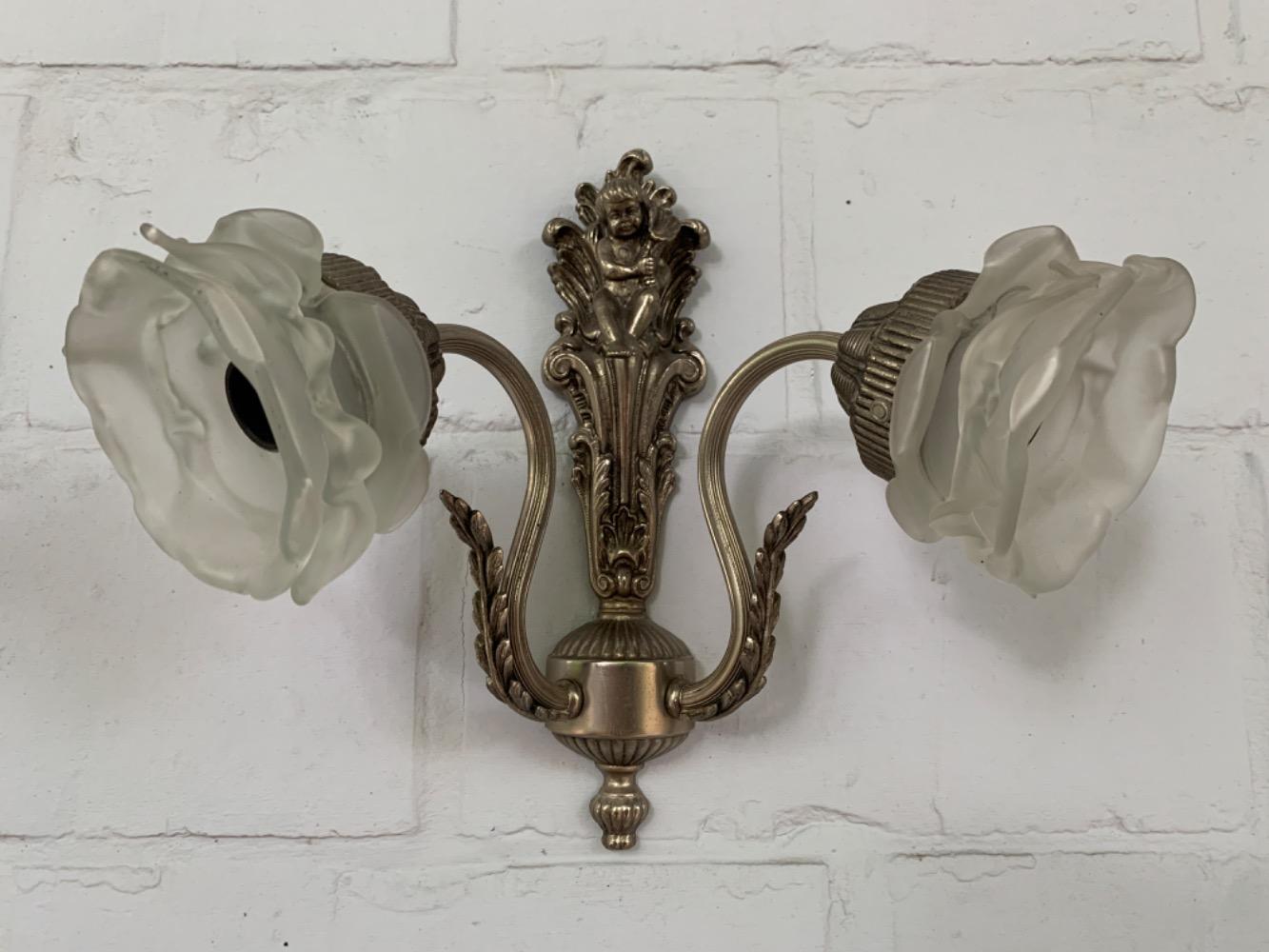 Rococo Pair of wall lights.